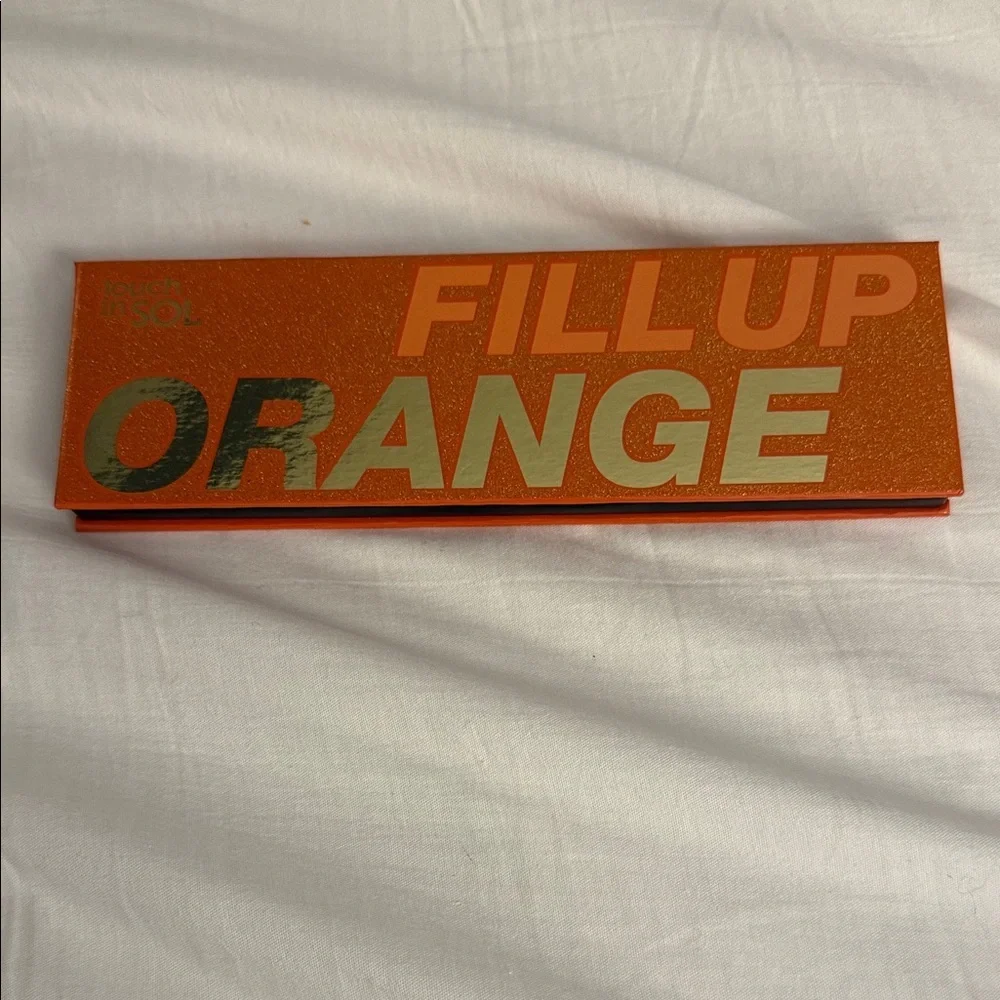 Touch in sol fill up orange eyeshadow palette new!